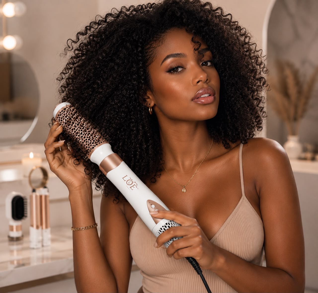 Model styling voluminous curls with the LBY round brush attachment